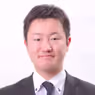 飯田 桂 先生の顔写真